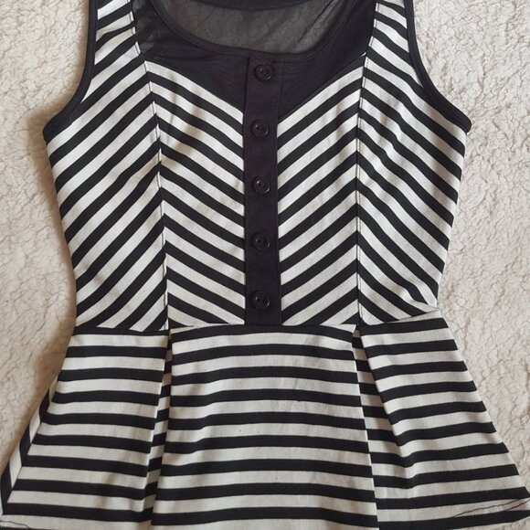 Pretty black and white peplum top. - Picture 3 of 6